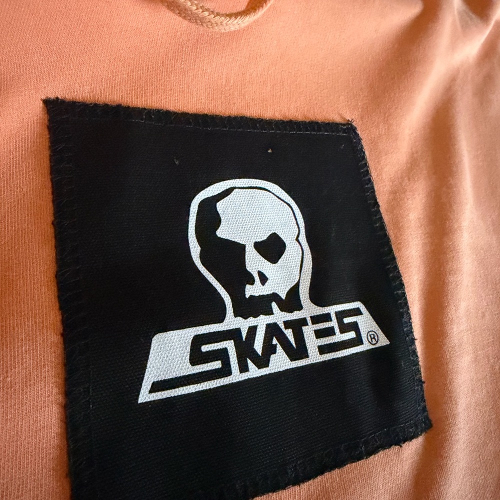 Peach skull skates hoodie
